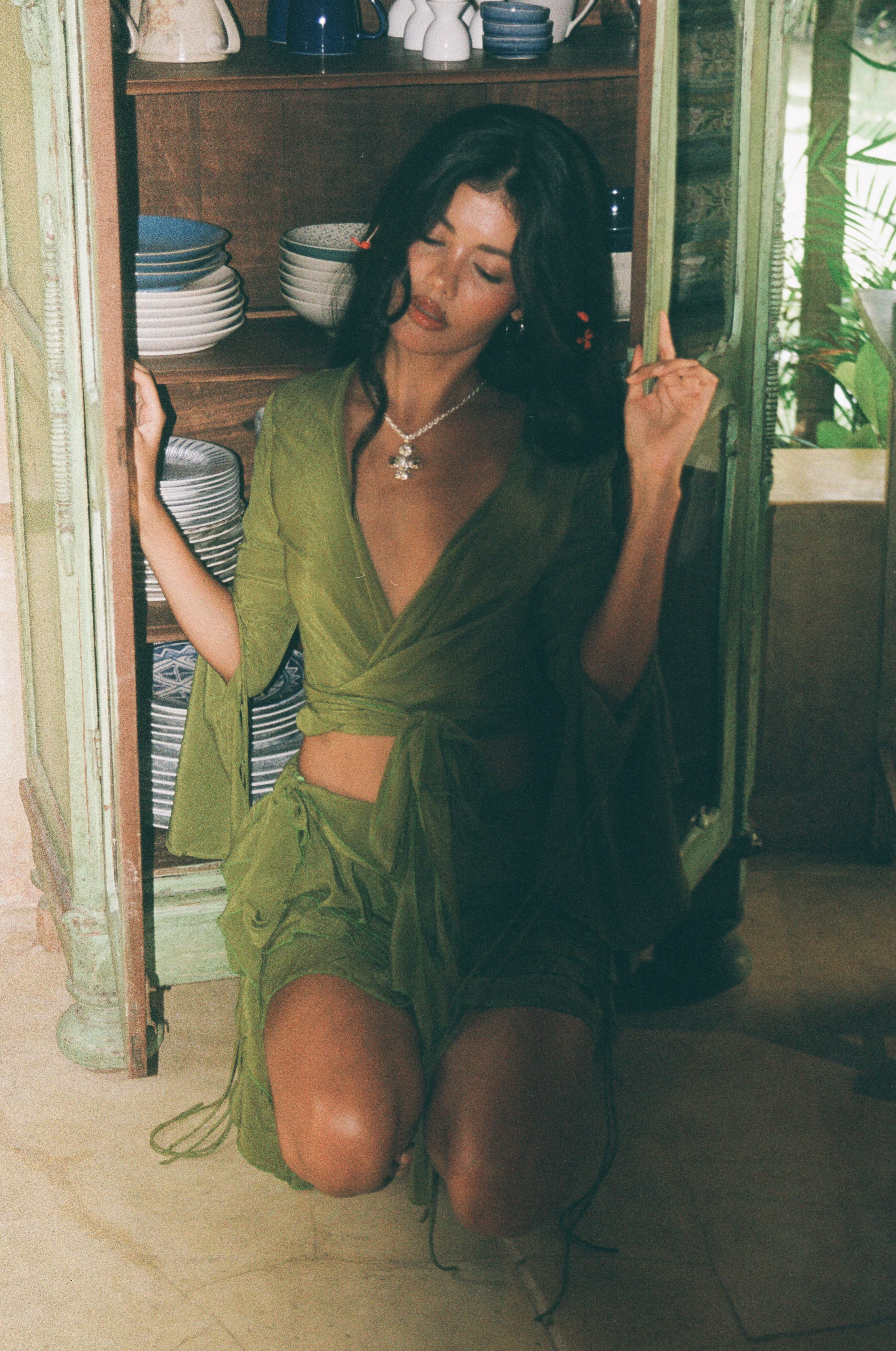 sage green wrap-style mini dress